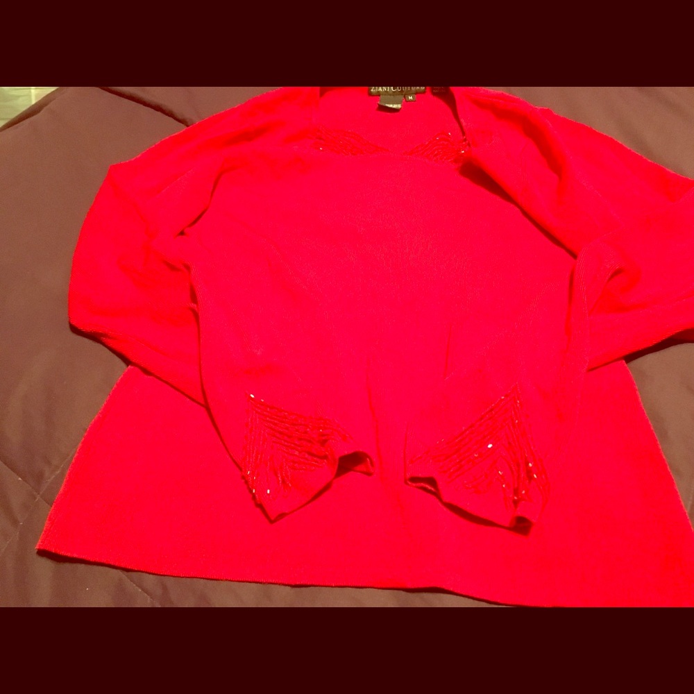 Red sweater with sequins embellished